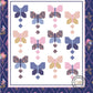 Butterfly pattern quilt design with 'Flight Trail' text and Coach House Designs logo on a blue floral background.