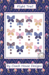 Butterfly pattern quilt design with 'Flight Trail' text and Coach House Designs logo on a blue floral background.
