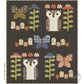 Lap Quilt with owl blocks, mushroom blocks, flower blocks  and butterfly blocks  on a dark background