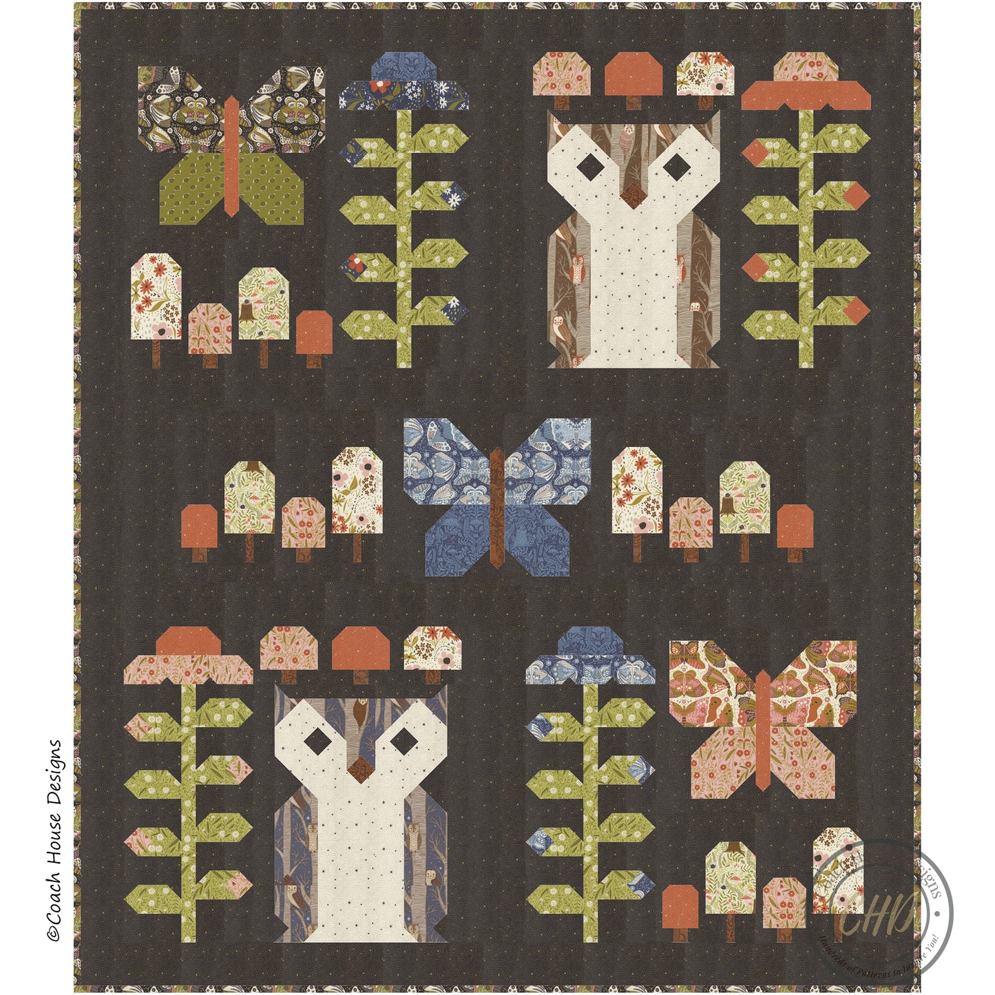 Lap Quilt with owl blocks, mushroom blocks, flower blocks  and butterfly blocks  on a dark background