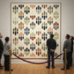 Colorful geometric patterned quilt with a white background
