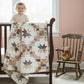 Quilt with star and chain pattern in various colors on a white background