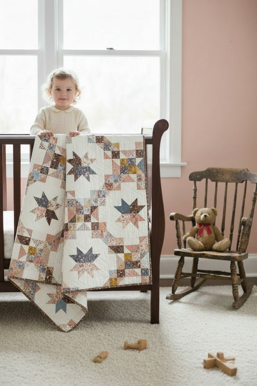 Quilt with star and chain pattern in various colors on a white background